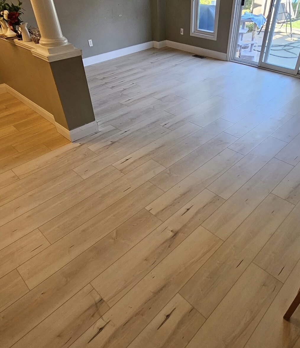 Light flooring installed through a living area